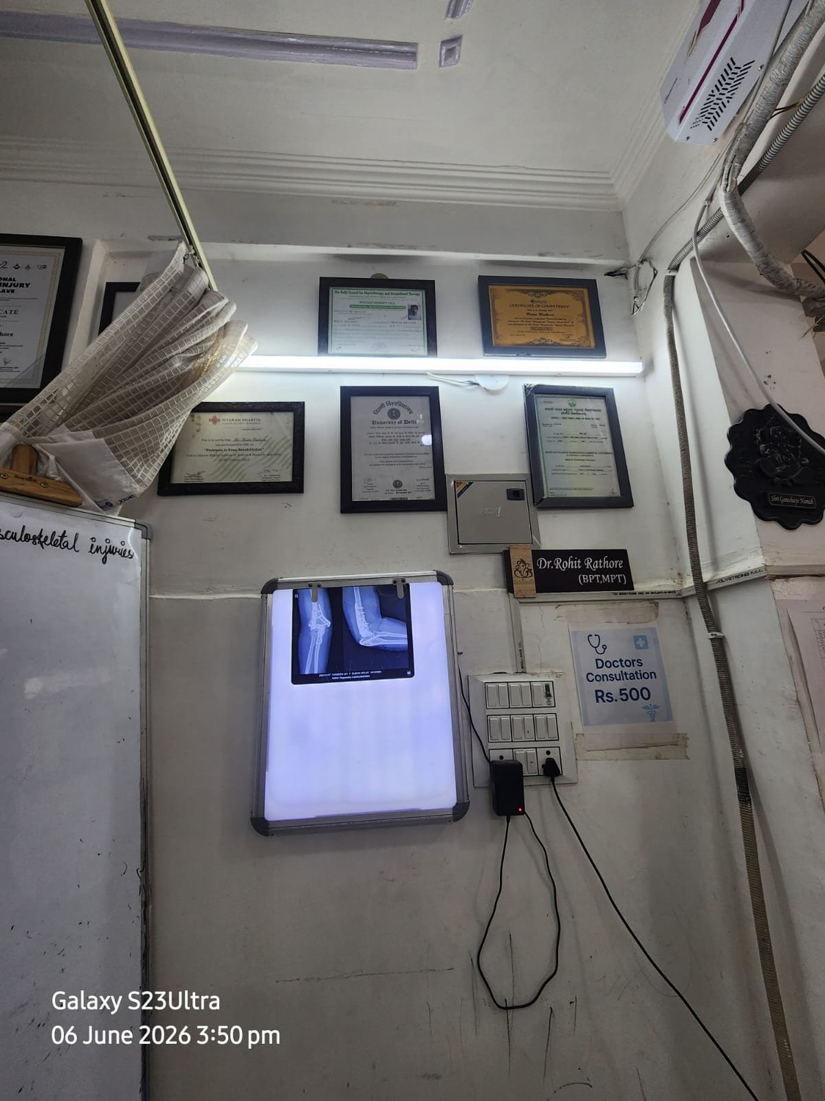 Certifications wall and X-ray viewer
